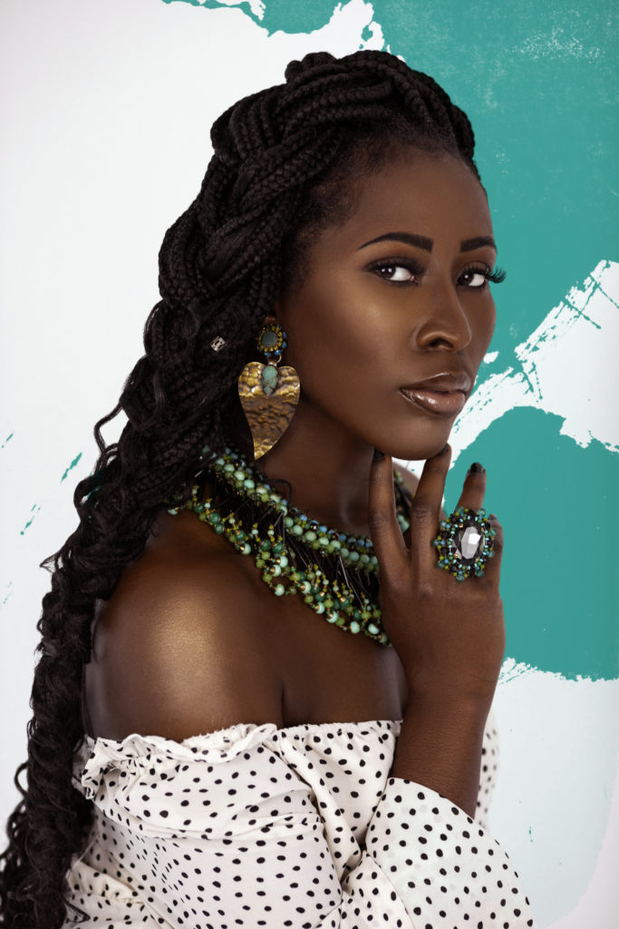Black girl in jewelry as an example for how Sustainable Fashion in India is Making a Real Impact on the Industry